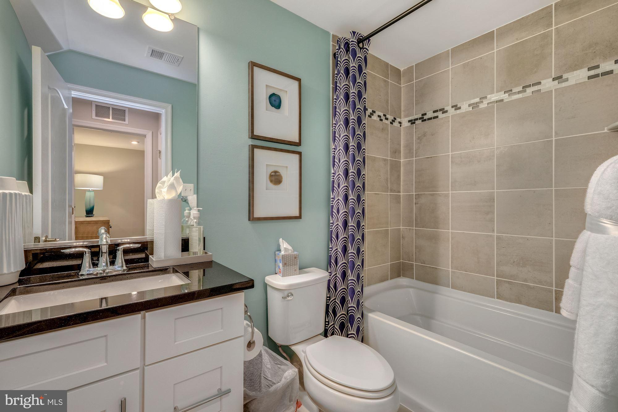 4004 Millner Road Nottingham, MD 21236 - Photo 29 of 34 a bathroom with a sink a toilet and shower