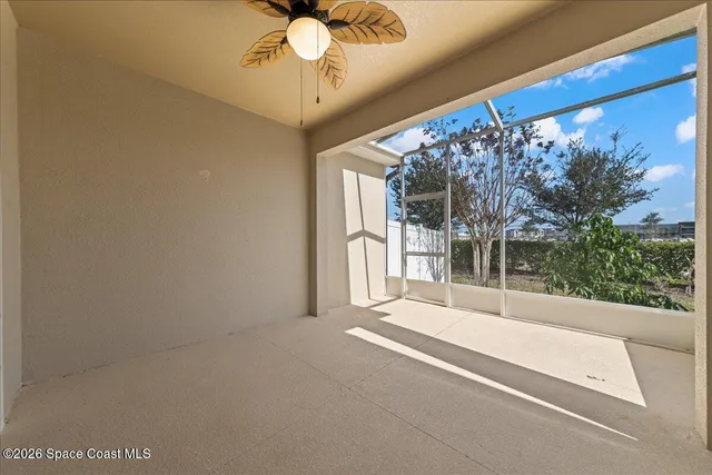 a view of a room with a large window