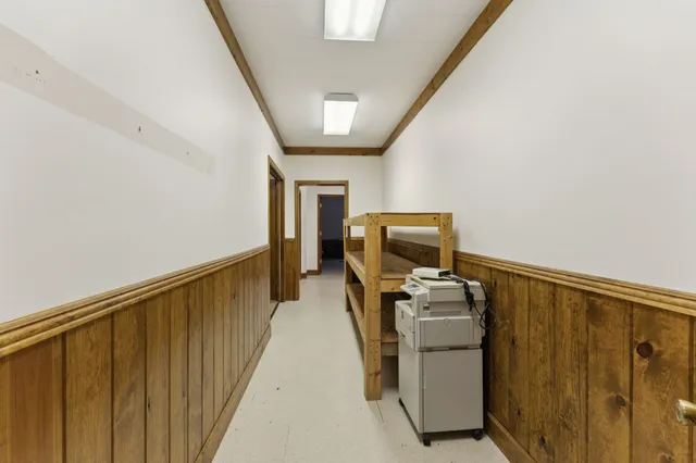 a view of a hallway with washer and dryer