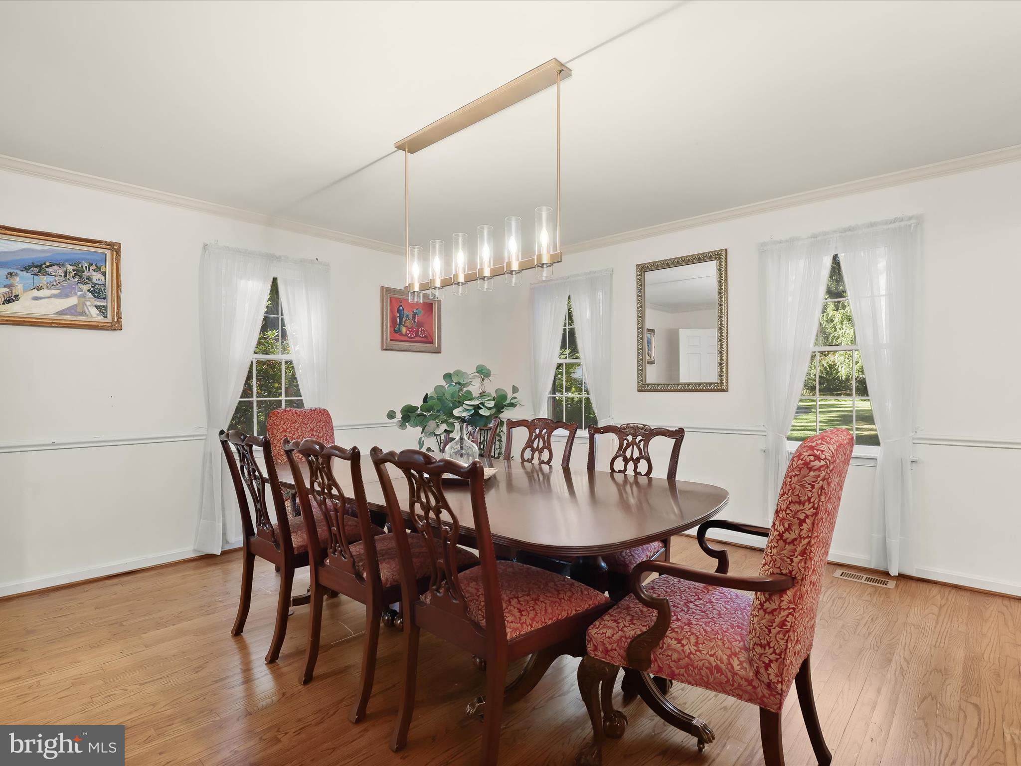 13719 Killarney Court Phoenix, MD 21131 - Photo 20 of 81 a view of a dining room with furniture and wooden floor
