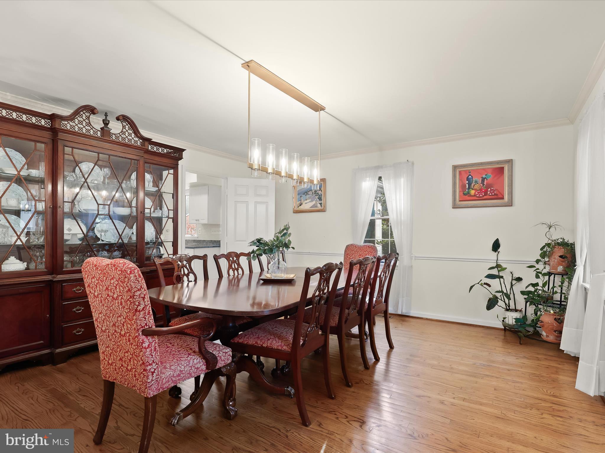 13719 Killarney Court Phoenix, MD 21131 - Photo 21 of 81 a view of a dining room with furniture window and wooden floor