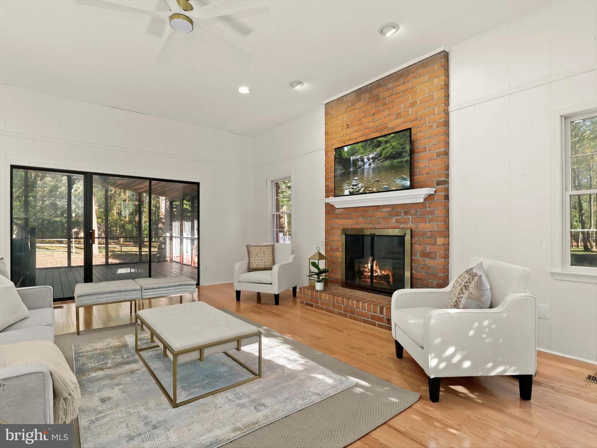 13719 Killarney Court Phoenix, MD 21131 - Photo 23 of 81 a living room with furniture and a fireplace