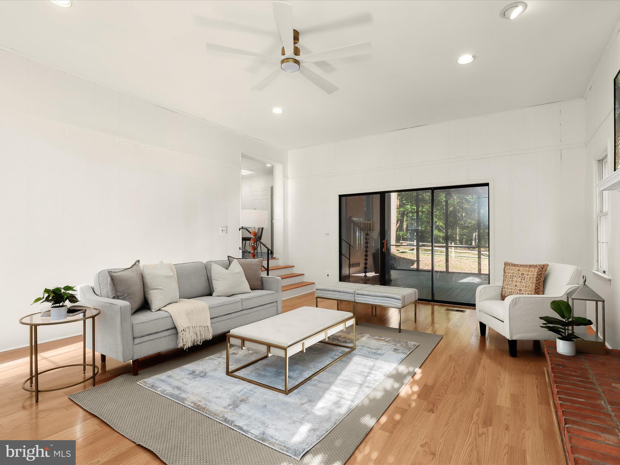 13719 Killarney Court Phoenix, MD 21131 - Photo 24 of 81 a living room with furniture and a large window