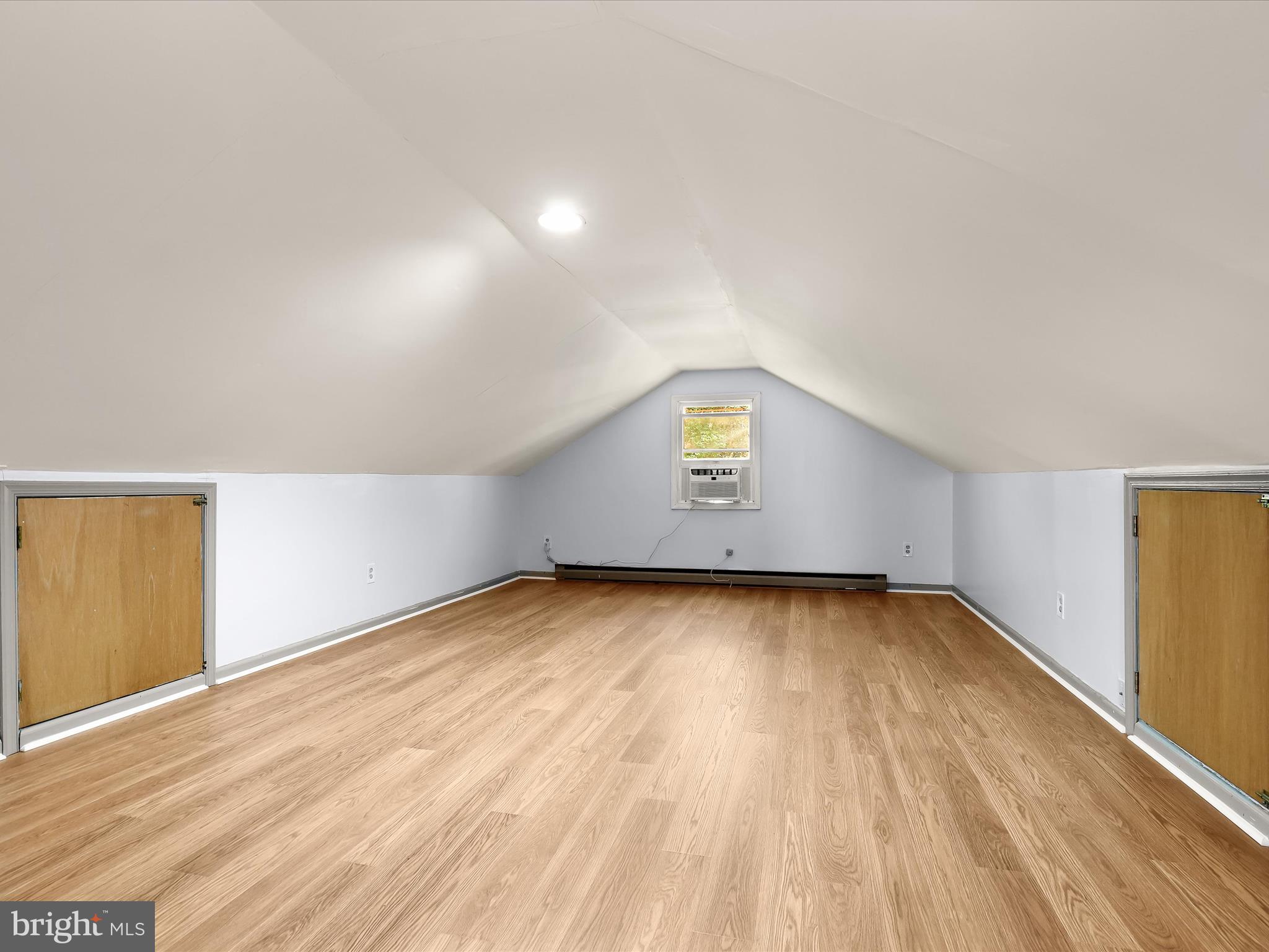 13719 Killarney Court Phoenix, MD 21131 - Photo 44 of 81 a view of an empty room with wooden floor and a window