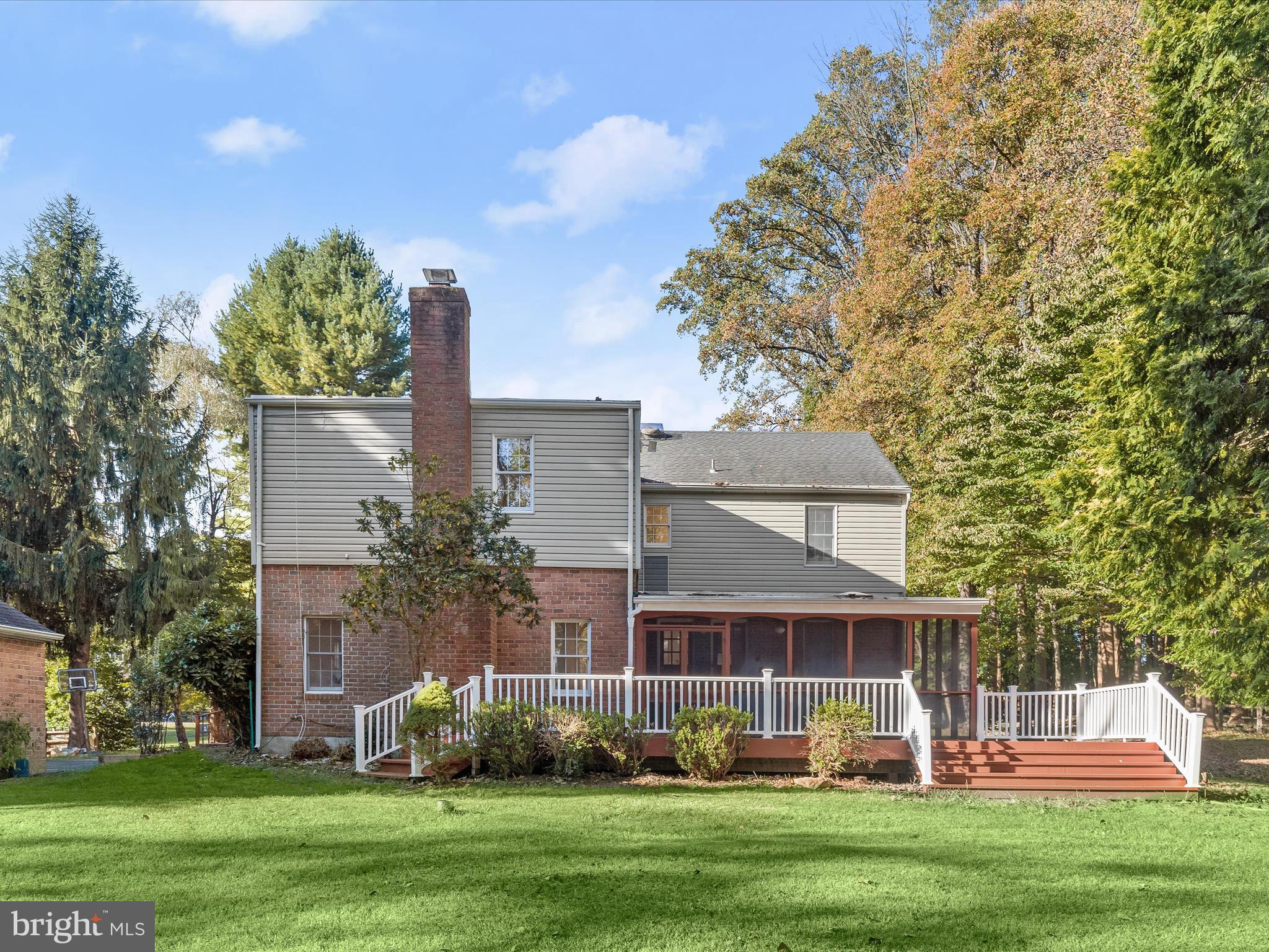 13719 Killarney Court Phoenix, MD 21131 - Photo 65 of 81 a front view of a house with a yard and trees