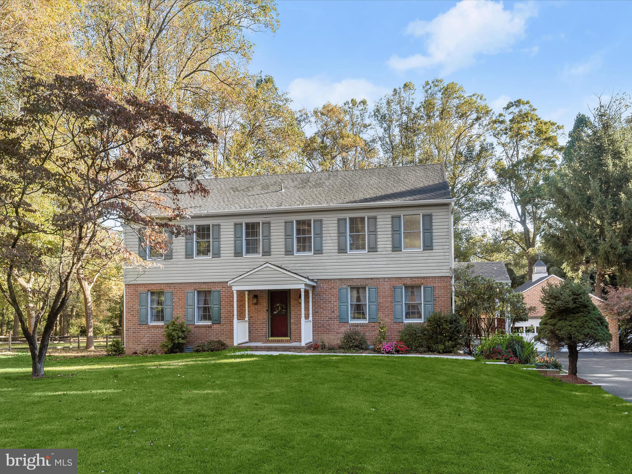 13719 Killarney Court Phoenix, MD 21131 - Photo 69 of 81 a front view of a residential houses with yard and green space