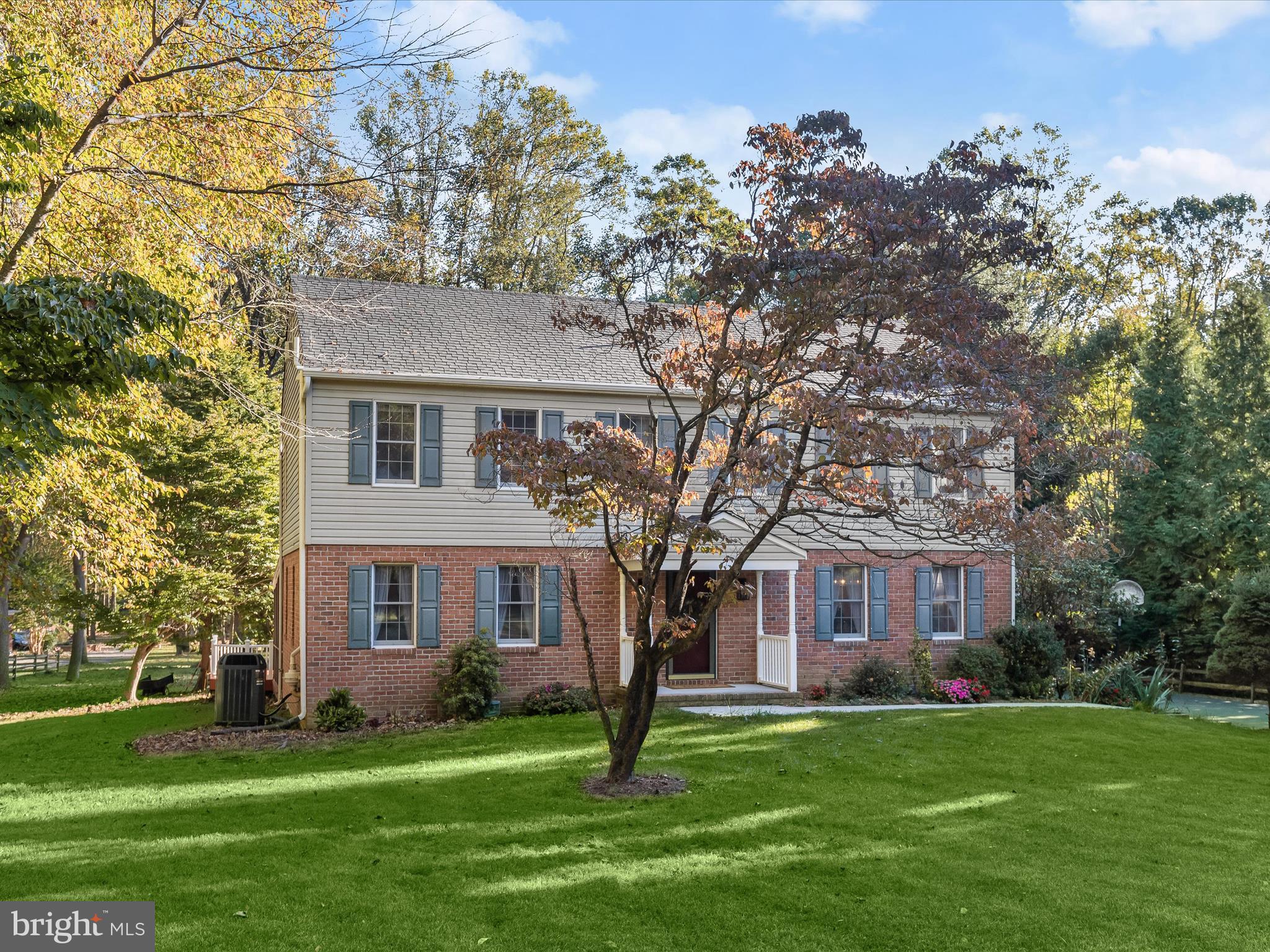 13719 Killarney Court Phoenix, MD 21131 - Photo 71 of 81 a front view of a house with a garden