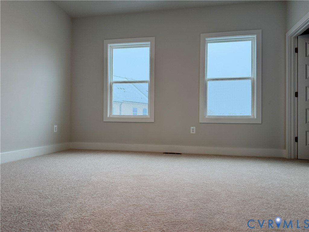 9450 Belladdie Way Glen Allen, VA 23059 - Photo 12 of 23 an empty room with a window