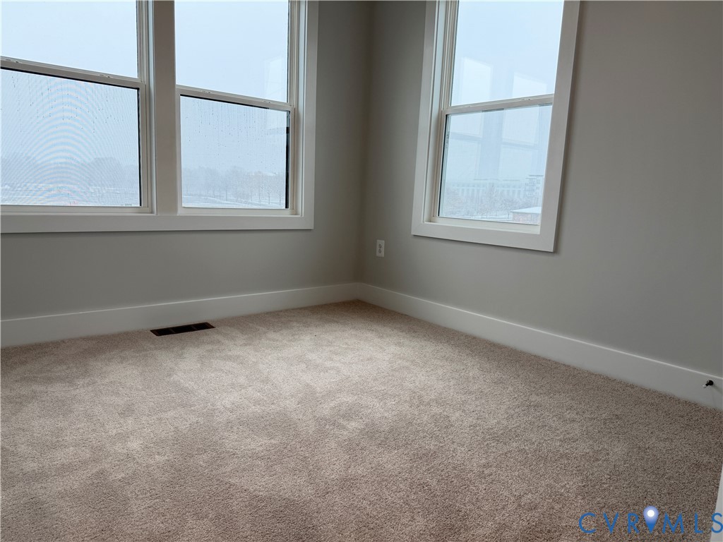 9450 Belladdie Way Glen Allen, VA 23059 - Photo 15 of 23 an empty room with a window