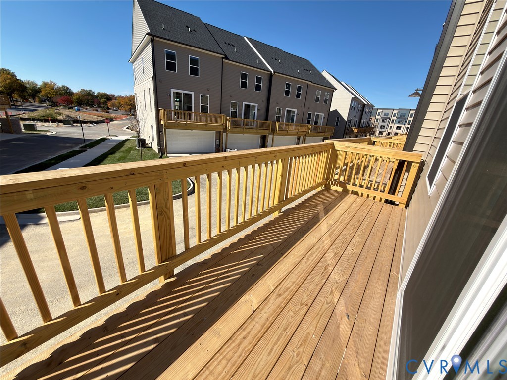 9450 Belladdie Way Glen Allen, VA 23059 - Photo 23 of 23 a view of a street with wooden fence