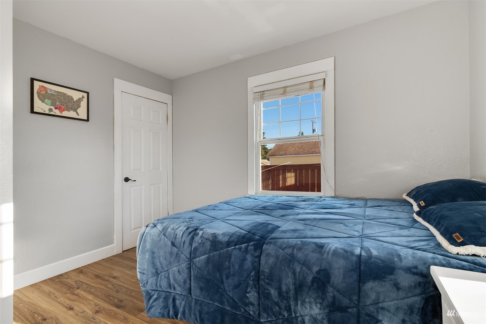 7236 South Montgomery Street Tacoma, WA 98409 - Photo 14 of 34 a bedroom with a bed and a dresser