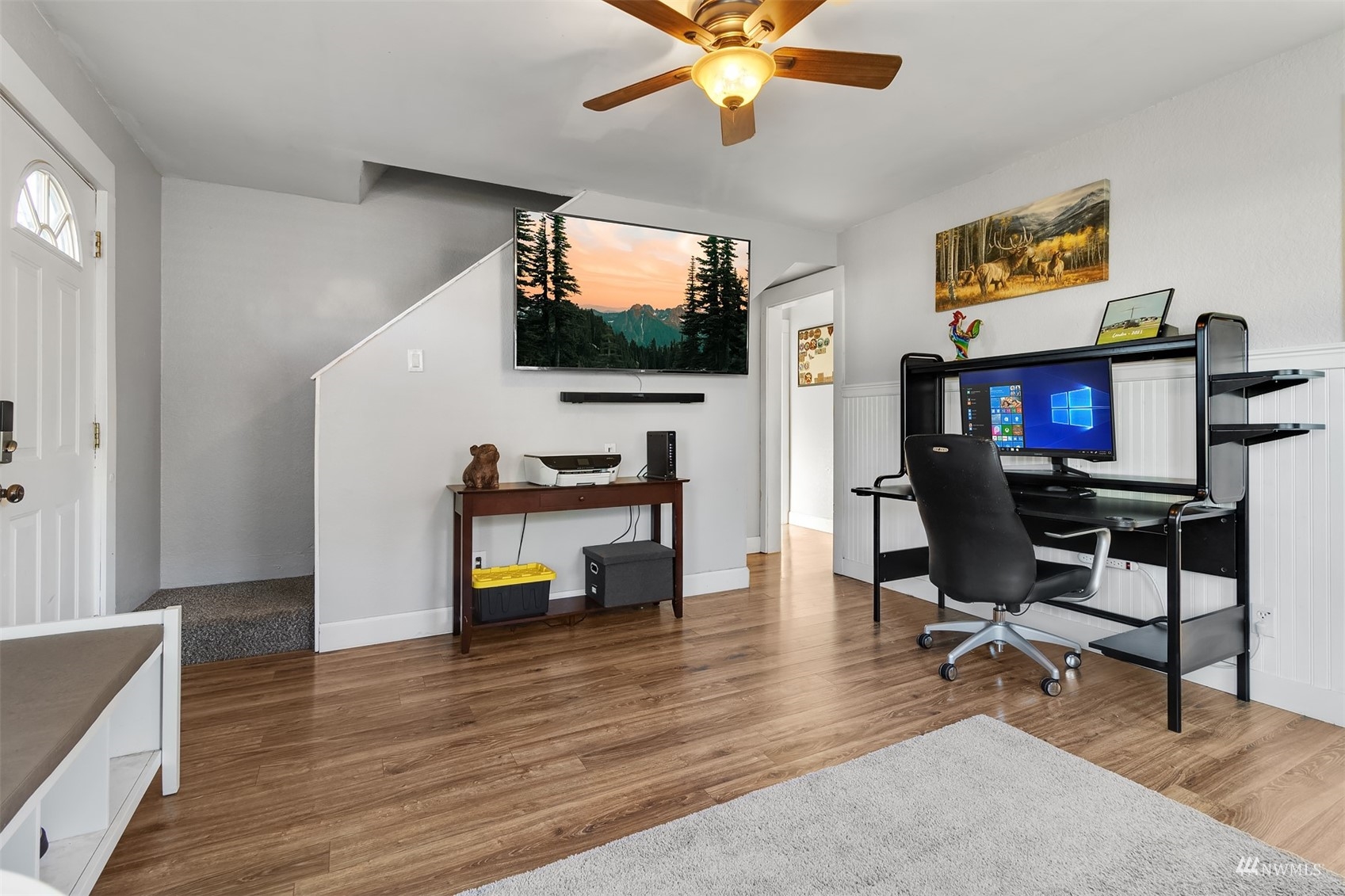 7236 South Montgomery Street Tacoma, WA 98409 - Photo 7 of 34 a living room with furniture and a flat screen tv