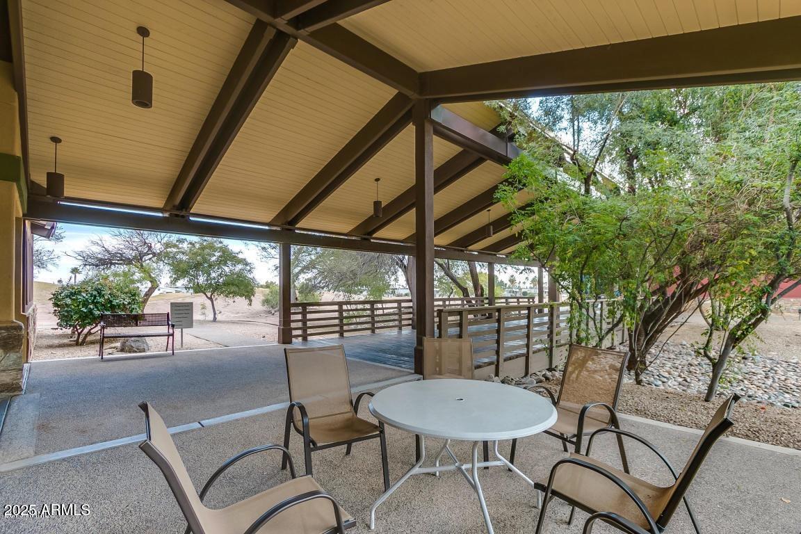 17200 West Bell Road, Unit 976 Surprise, AZ 85374 - Photo 10 of 16 a outdoor space with chairs