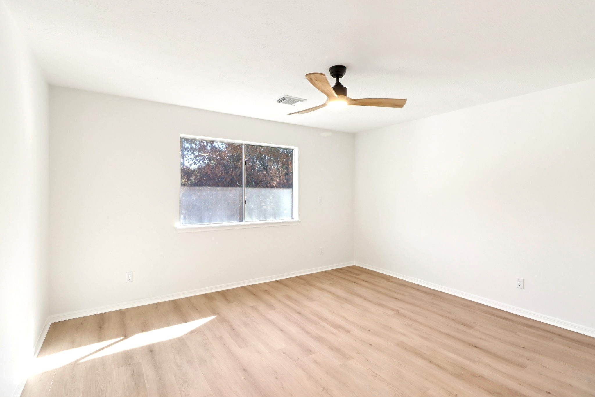 30122 Falher Drive Spring, TX 77386 - Photo 20 of 36 a view of an empty room with a window