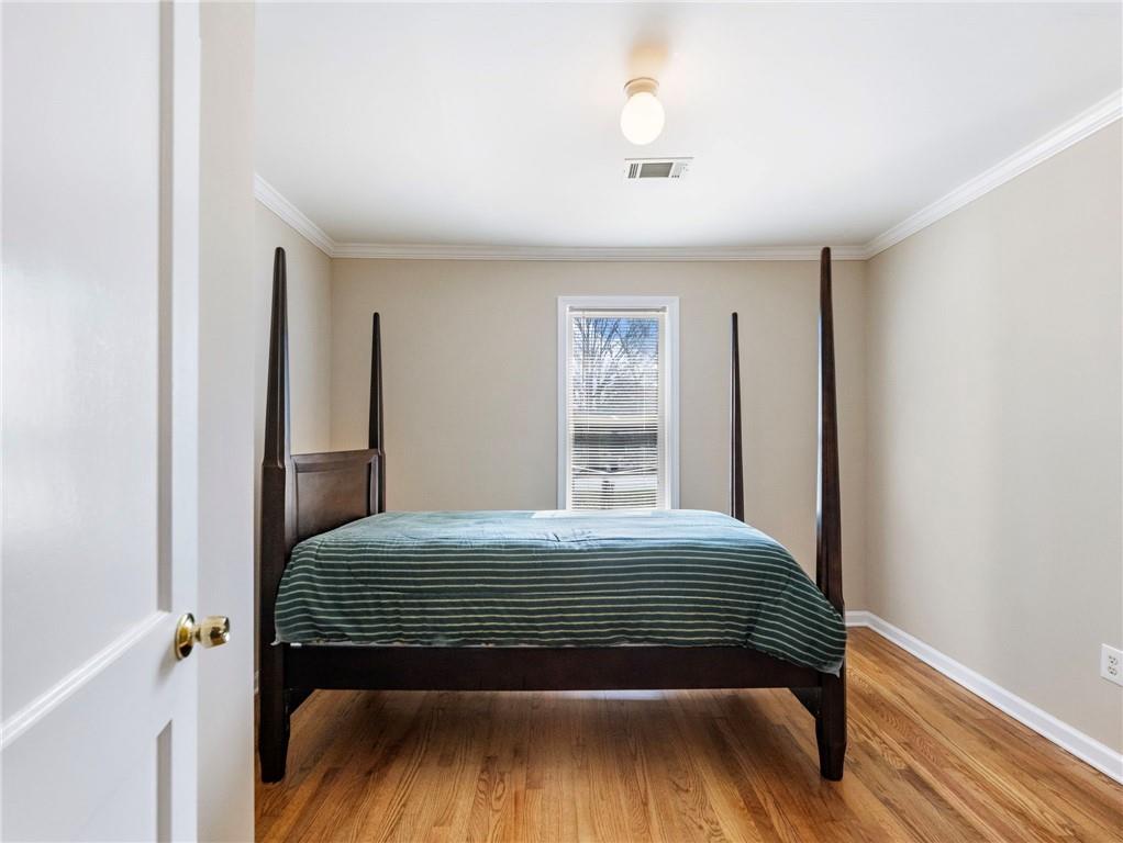 1686 Shoal Creek Road Monroe, GA 30656 - Photo 26 of 50 a bedroom with a bed and a window