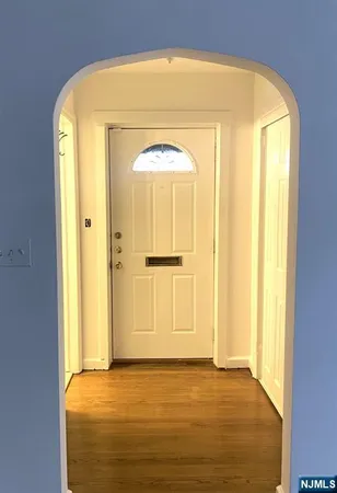 a view of a bathroom with a glass door