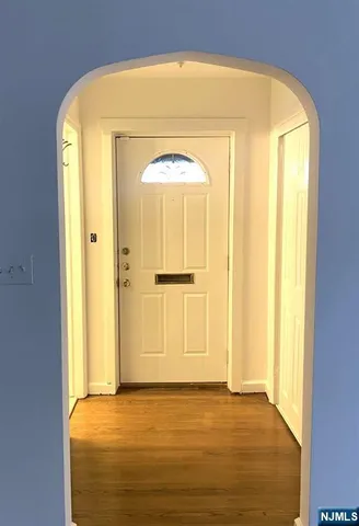 a view of a bathroom with a glass door