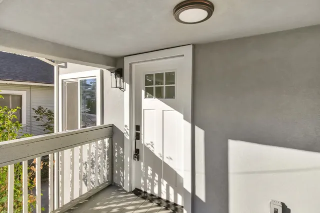 a view of a balcony with an outdoor space