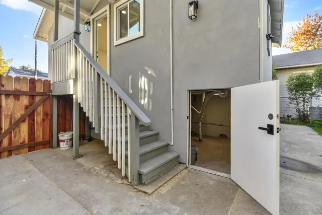 a view of a room with rack and windows