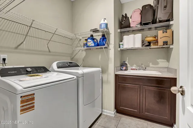 a utility room with dryer and washer