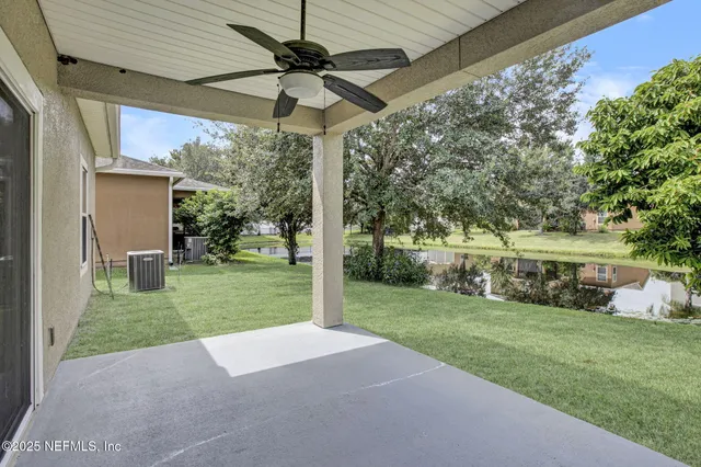 a view of a porch and garden