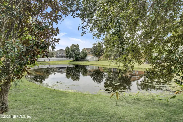 a view of a lake with houses
