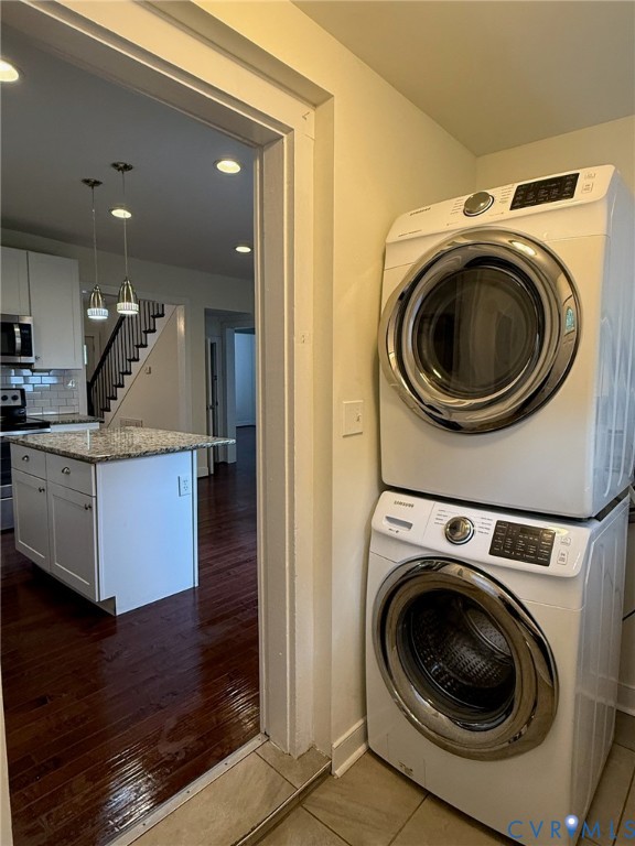 3109 Johnson Road Richmond, VA 23223 - Photo 16 of 21 Laundry area with stacked washer and clothes dryer