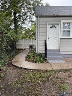 3109 Johnson Road Richmond, VA 23223 - Photo 19 of 21 View of back entry steps and a gate