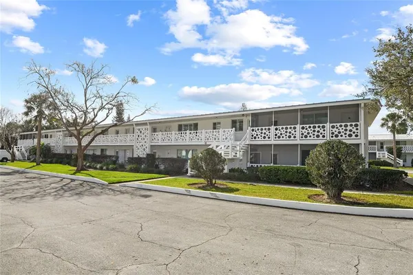 a view of pool with outdoor seating