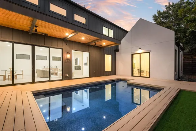 a view of balcony with furniture and wooden floor