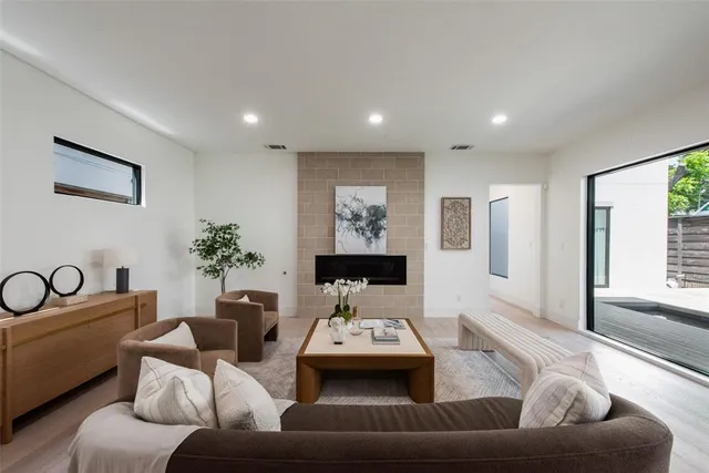 a living room with furniture and window