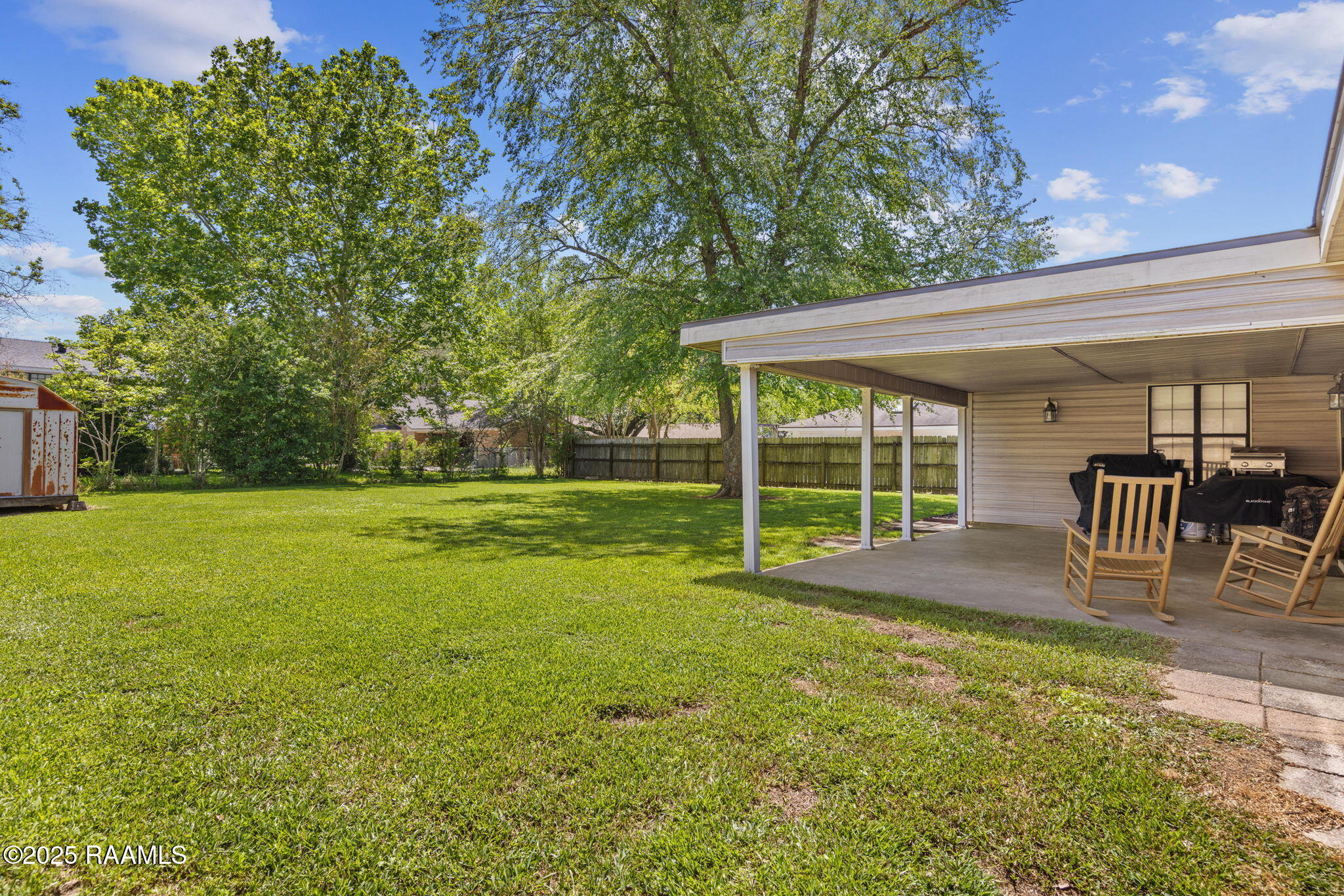 104 Parsonage Lane Lafayette, LA 70503 - Photo 20 of 26 Back Patio Sitting