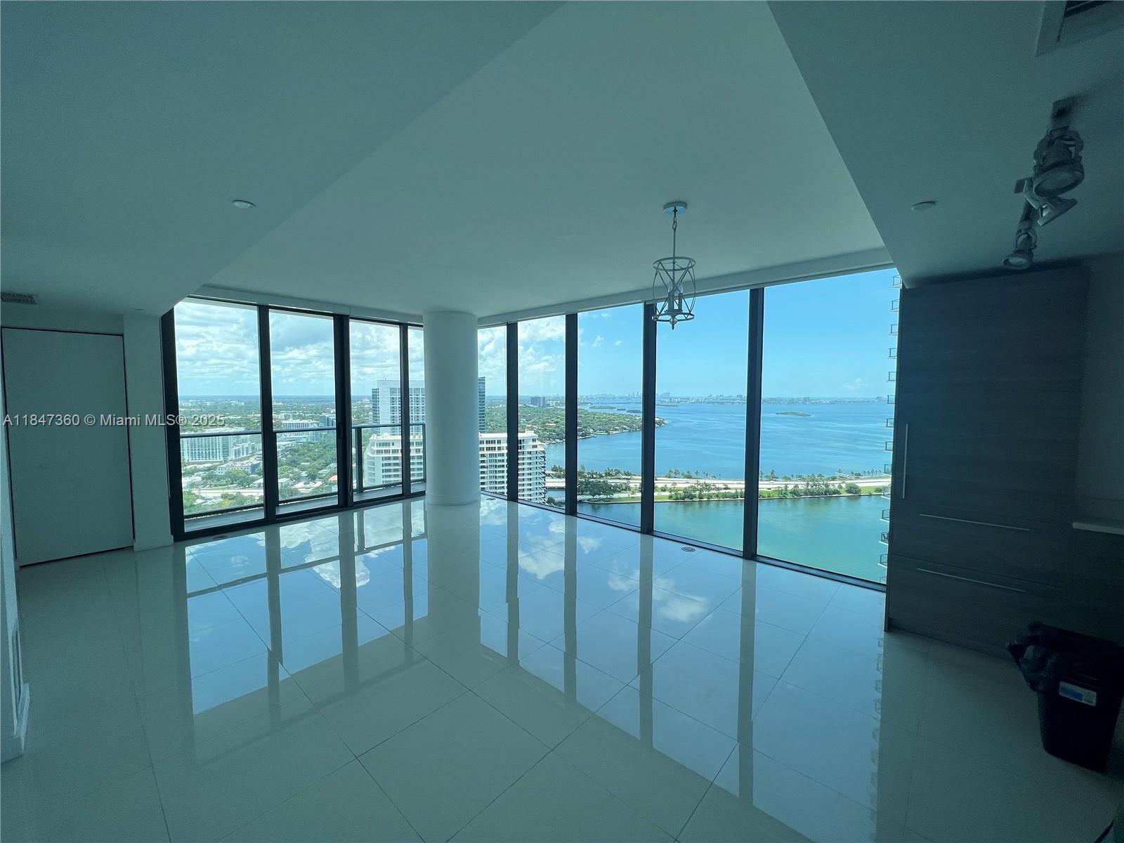 650 Northeast 32nd Street, Unit 3508 Miami, FL 33137 - Photo 4 of 13 a view of an empty room with a window