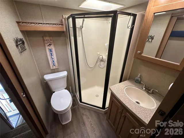 a bathroom with a sink and mirror