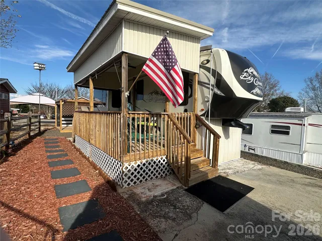 a view of a porch with furniture