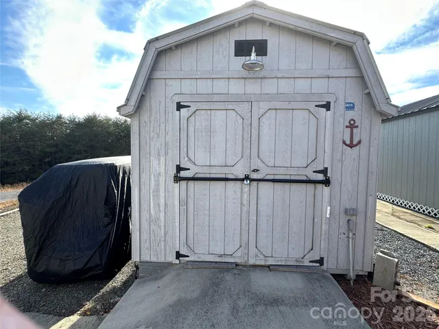 a view of a back yard of the house