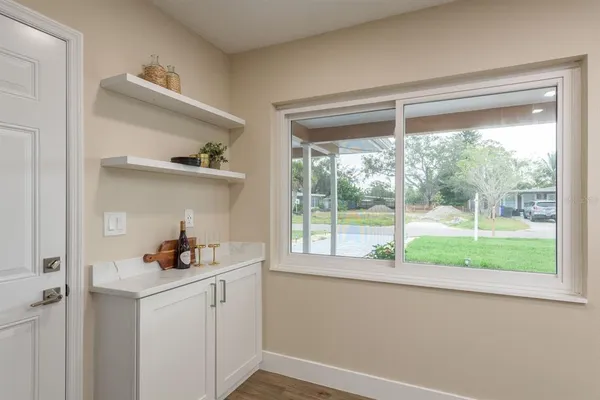 a kitchen with stainless steel appliances a sink stove and refrigerator