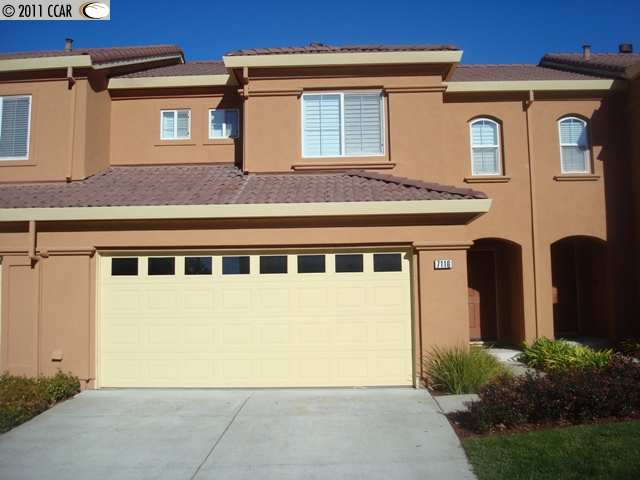 7116 Briza Loop San Ramon, CA 94582 - Photo 1 of 1 a front view of a house with a yard