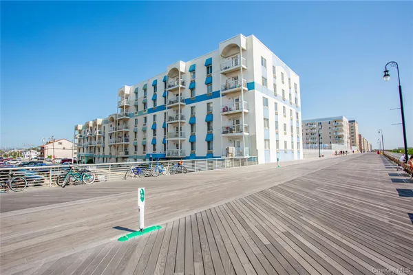 a front view of a building with outdoor area