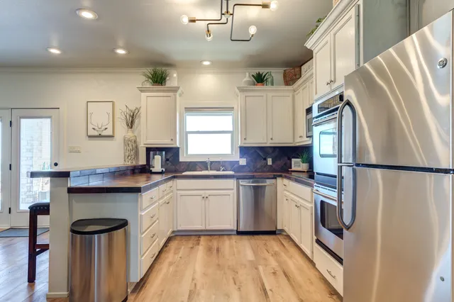 a living room with a couch and a window