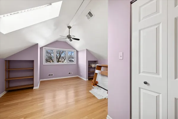 wooden floor in a white room