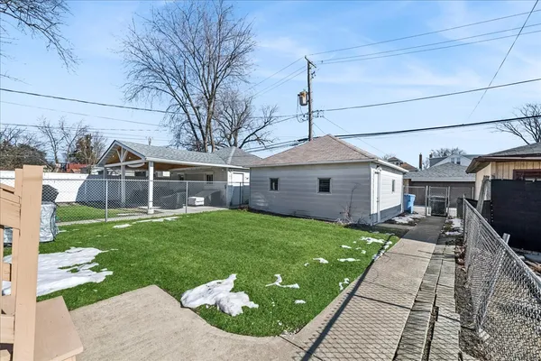 a house view with a garden space