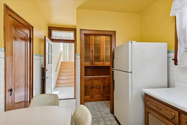 a view of kitchen and utility room