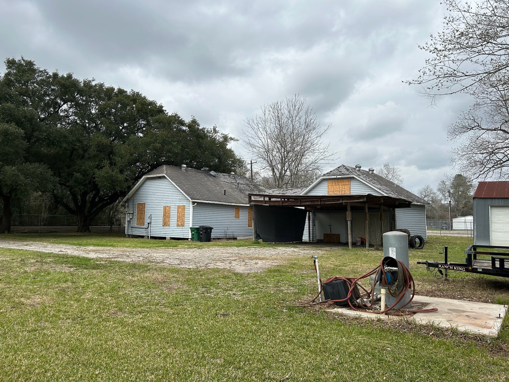 14201 Labrador Drive Houston, TX 77047 - Photo 6 of 11 a front view of a house with garden
