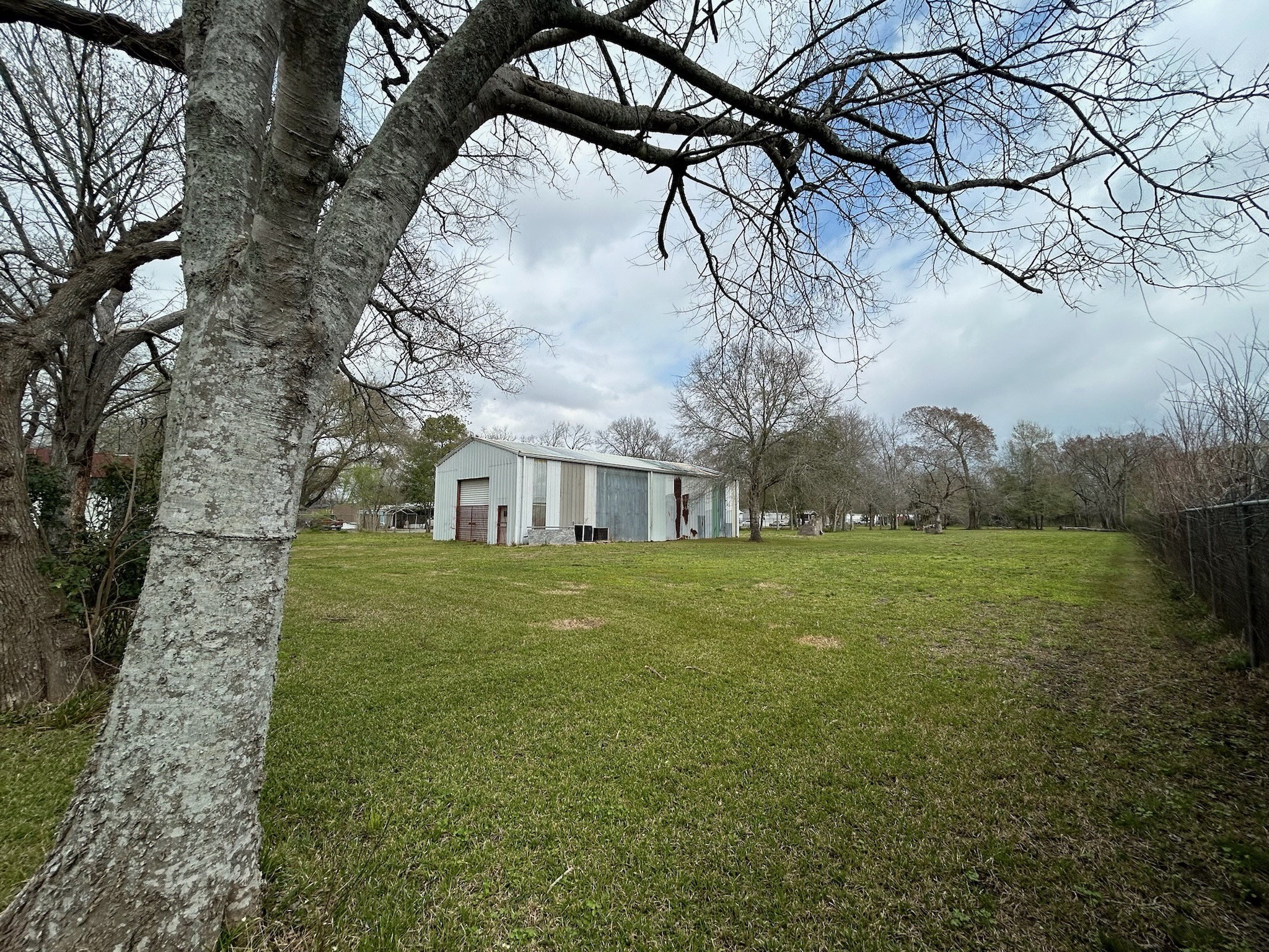 14201 Labrador Drive Houston, TX 77047 - Photo 7 of 11 a view of a house with a yard