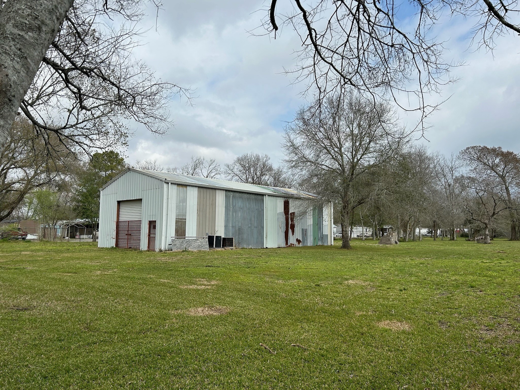14201 Labrador Drive Houston, TX 77047 - Photo 9 of 11 a view of a house with a yard
