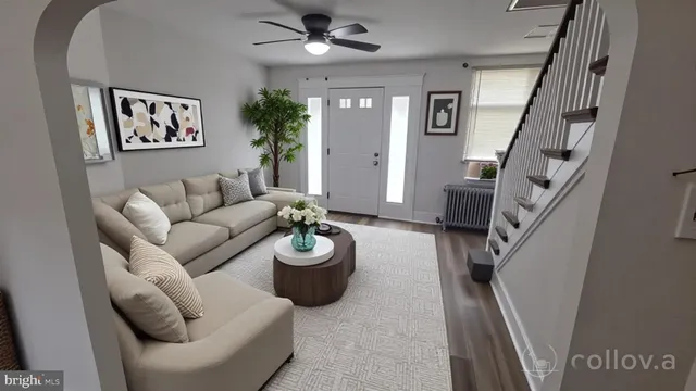 a living room with furniture and a rug