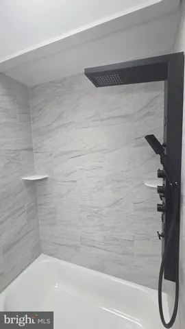 a bathroom with a bathtub