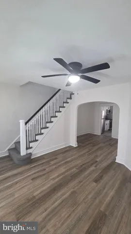 a view of entryway with wooden floor