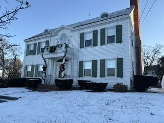 a front view of a white building